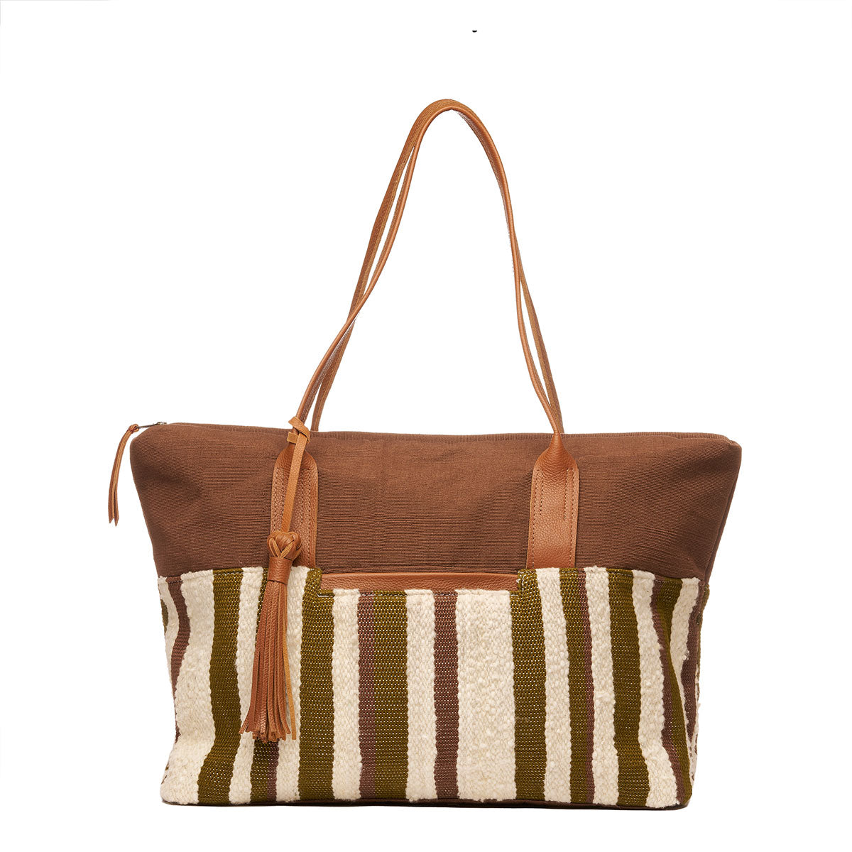 Hand woven artisan Soledad Weekender in Forest pattern. The front of the bag is shown with a horizontal brown fabric, vertical beige and green stripes, leather handles, a tassel, and a leather zipper pull to the left.