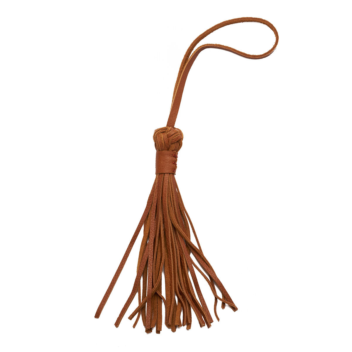 Hand woven artisan Celestina Tassel in chestnut color. The dark brown tassel has small braids that tie loose ends with a loop at the top.