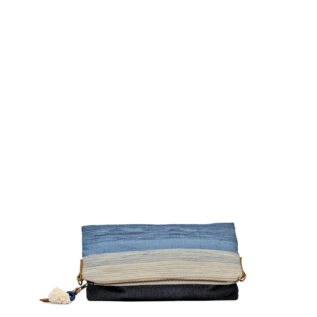 A folded view of the Florentina Clutch-to-Hobo in Ocean Breeze. The pattern is a white to dark blue gradient. It has a white tassel and leather zipper pull. It is shown without the leather handle.