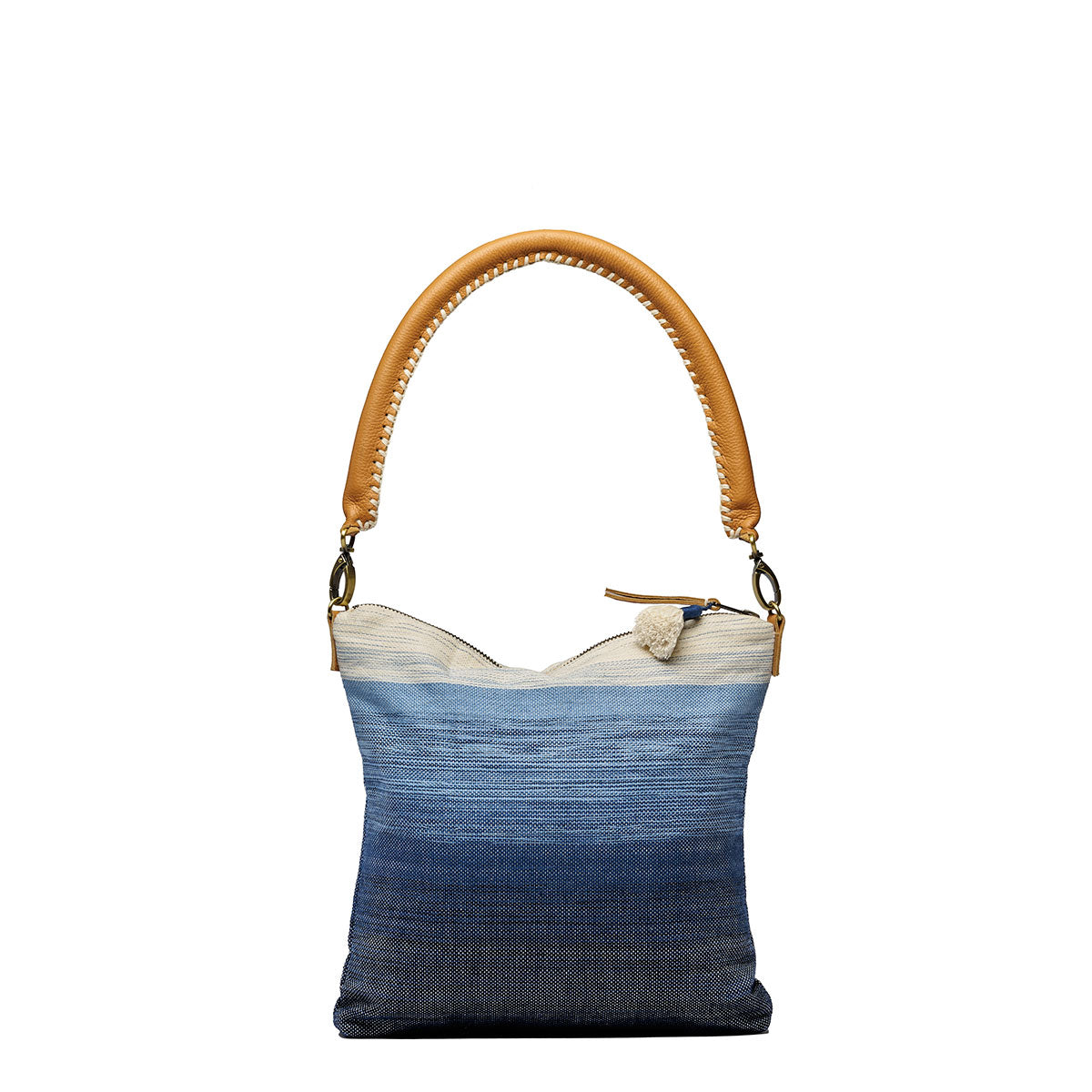 Florentina Clutch-to-Hobo in Ocean Breeze. Front unfolded view. The pattern is a white to dark blue gradient. It has a white tassel and leather zipper pull. It has a detachable leather strap with white embroidery.