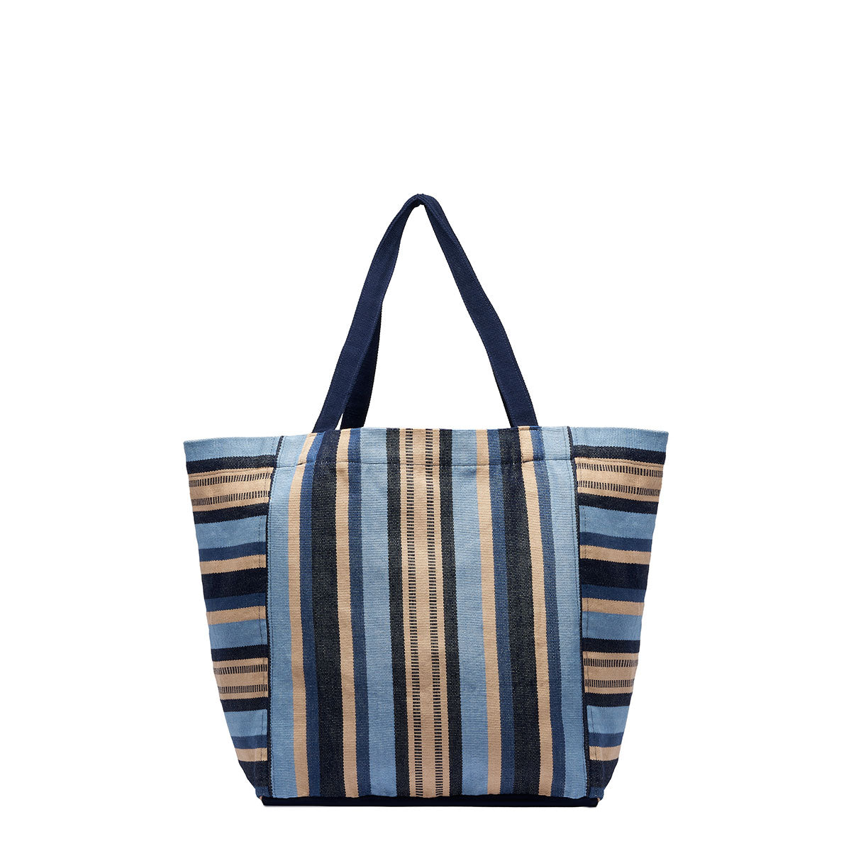 Blanca Tote in Skyscape. The pattern has vertical and horizontal navy, beige, and light blue stripes. It has dark blue handles.