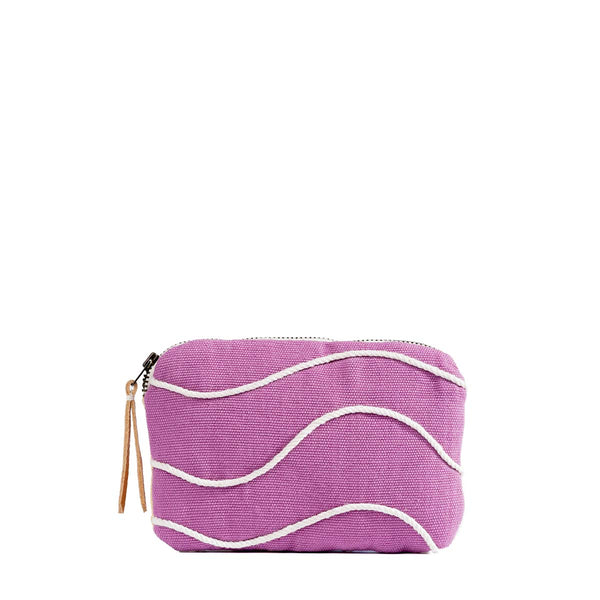 Front of the hand woven artisan Teresa Wallet in Cosmic Waves. It has a magenta solid background with thin wavy white stripes.